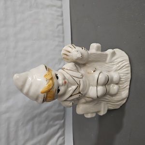 GOT porcelain sitting  litlle boy with dove  marked GOT made in China